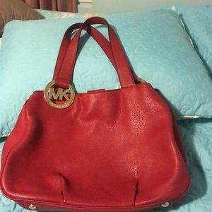 Red Michael Kors purse